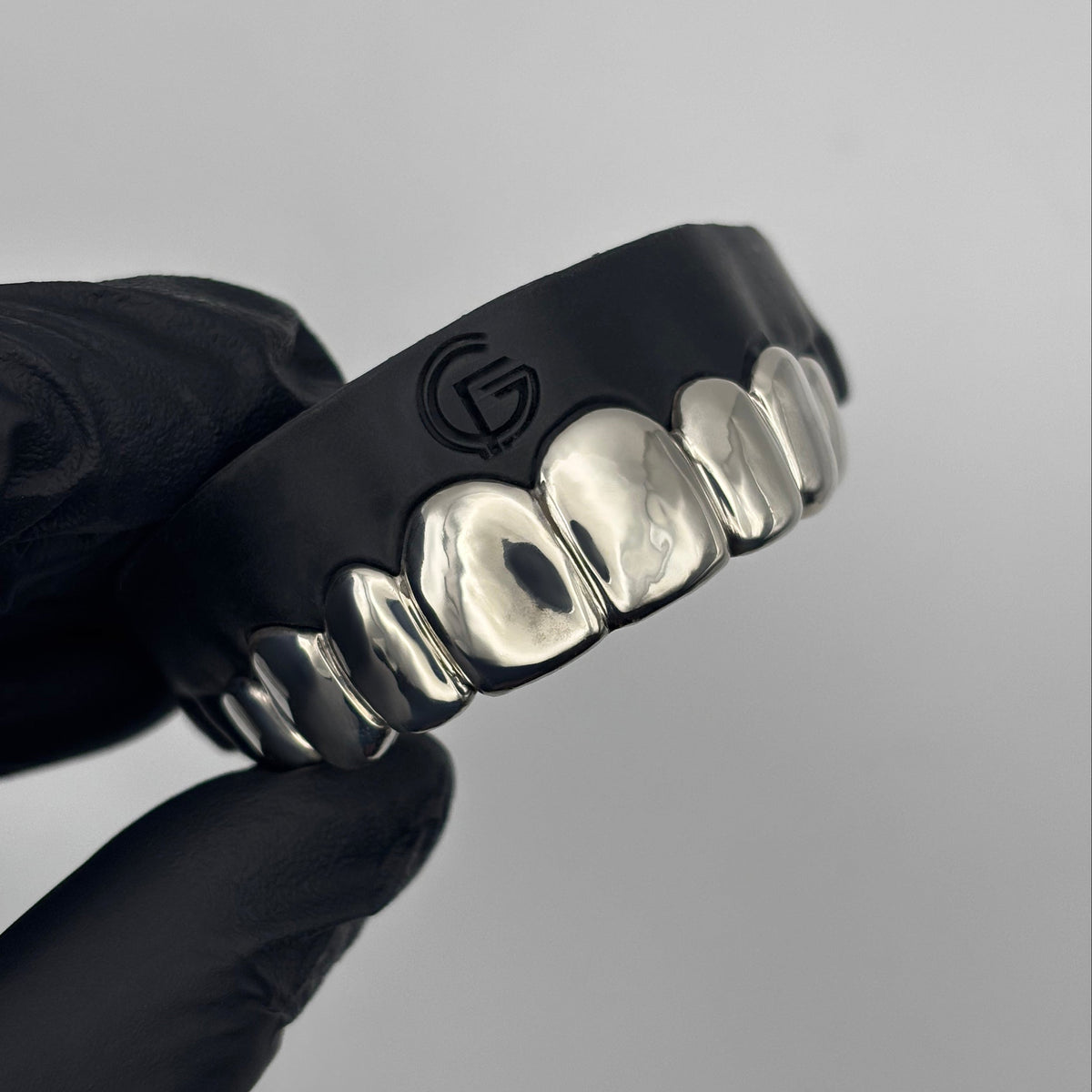 Custom 8 piece sterling silver grillz set handcrafted in New Zealand