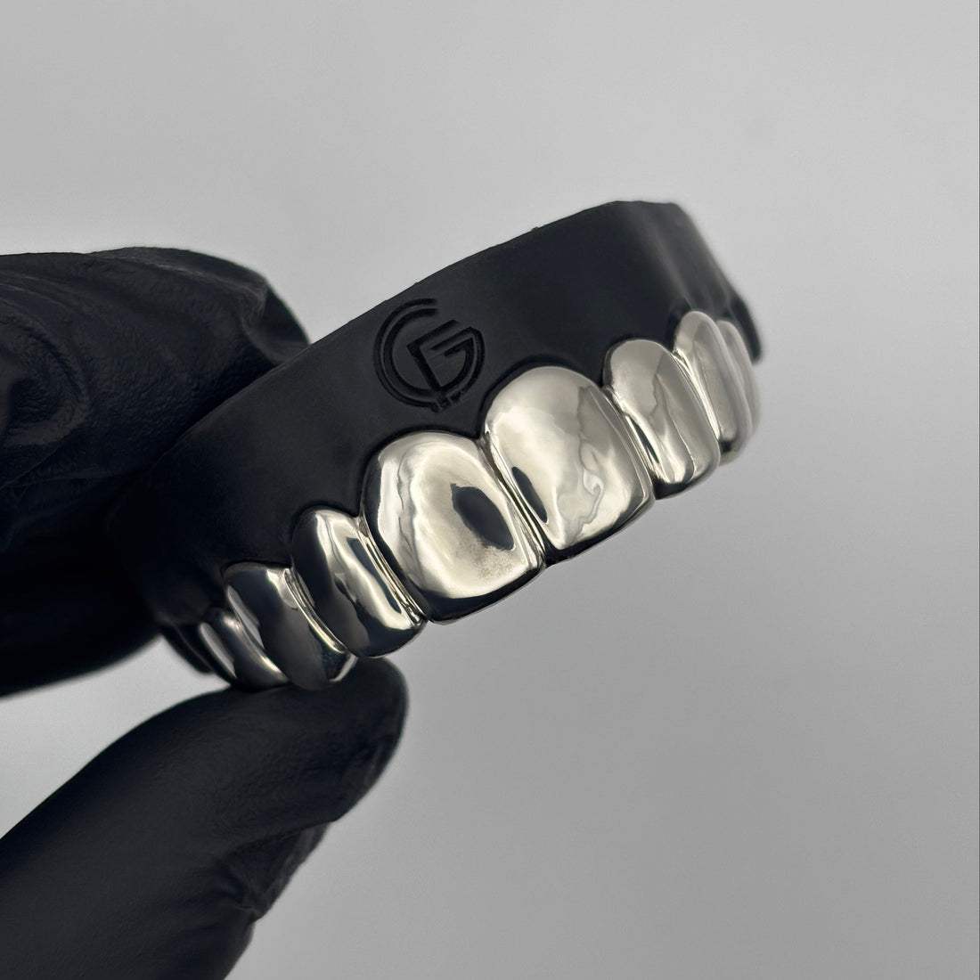 Custom 8 piece sterling silver grillz set handcrafted in New Zealand